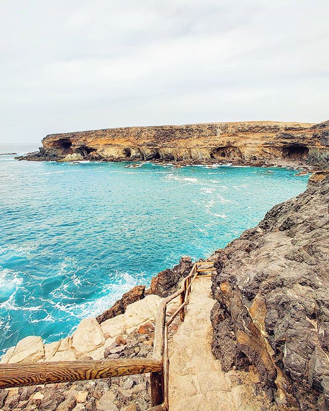 Step down to the cavern ‍♂️🤙 #ajuy #cuevas #cave #seaview #travelingram #canaryislands #traveling #traveller #fuerteventura #seascape #travellife #stairs #travelling #travelstoke #sealife #traveladdict #prilaga #travels #travelphoto #travelgram #seaside #travelawesome #travelblog #traveler #travelphotography #canary #sea #travel #waves